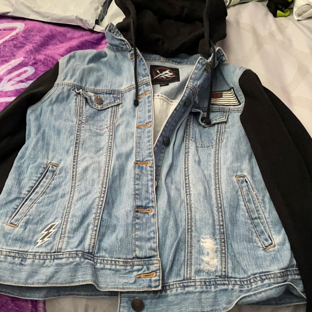 Jean jacket with black sweatshirt material and removable hood. Size XL